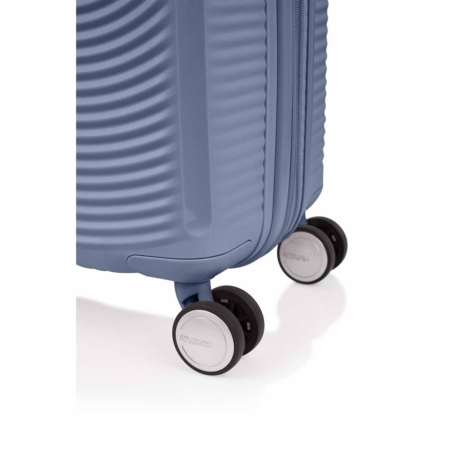 American-Tourister-Curio-2-55cm-Carry-On-Suitcase-Stone-Blue-Wheels