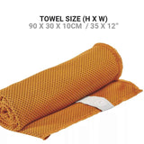 Orange towel rolled up with size information on a white background