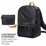 Black backpack with front pocket and small black pouch on a white background