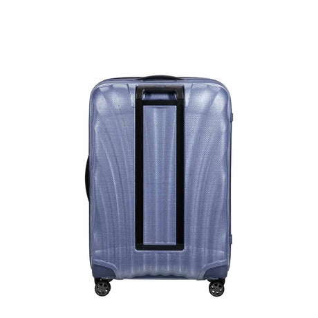 Lavender Samsonite suitcase with black handle on a white background
