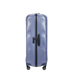 Lavender Samsonite suitcase with a clear design on a white background