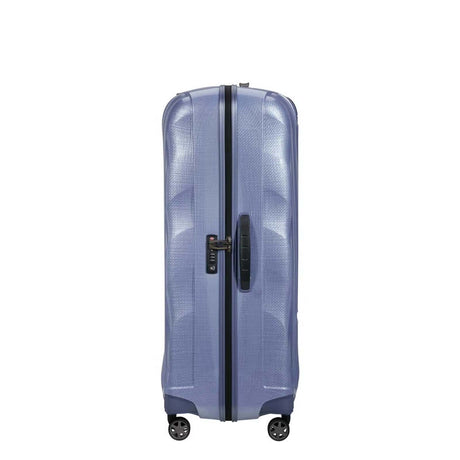 Lavender Samsonite suitcase with a clear design on a white background