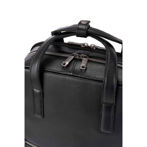 Close-up of a black pebbled leather bag with dual top handles, zipper closures, and silver-toned hardware on a plain white background.