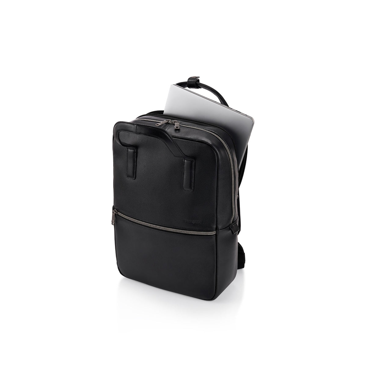 A black leather backpack shown at an angle on a white background, with a silver laptop partially tucked into the top zip compartment.