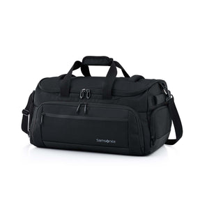 A black Samsonite duffel bag with multiple zippered pockets, top carry handles, and a detachable shoulder strap, photographed on a clean white background.