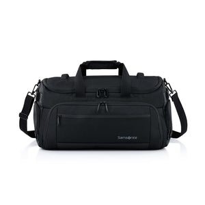 A black Samsonite duffel bag with top handles, a front zippered pocket, and an adjustable shoulder strap, photographed on a clean white background.