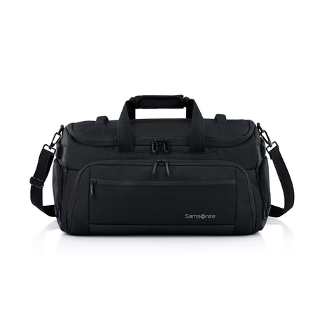 A black Samsonite duffel bag with top handles, a front zippered pocket, and an adjustable shoulder strap, photographed on a clean white background.
