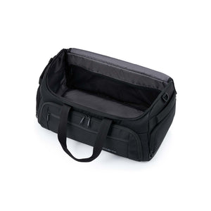 A black duffel bag shown open to display its interior, featuring dual top handles, zippered compartments, and a padded shoulder strap on a clean white background.