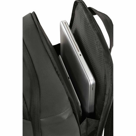 Dark Green backpack with a laptop compartment on a white background