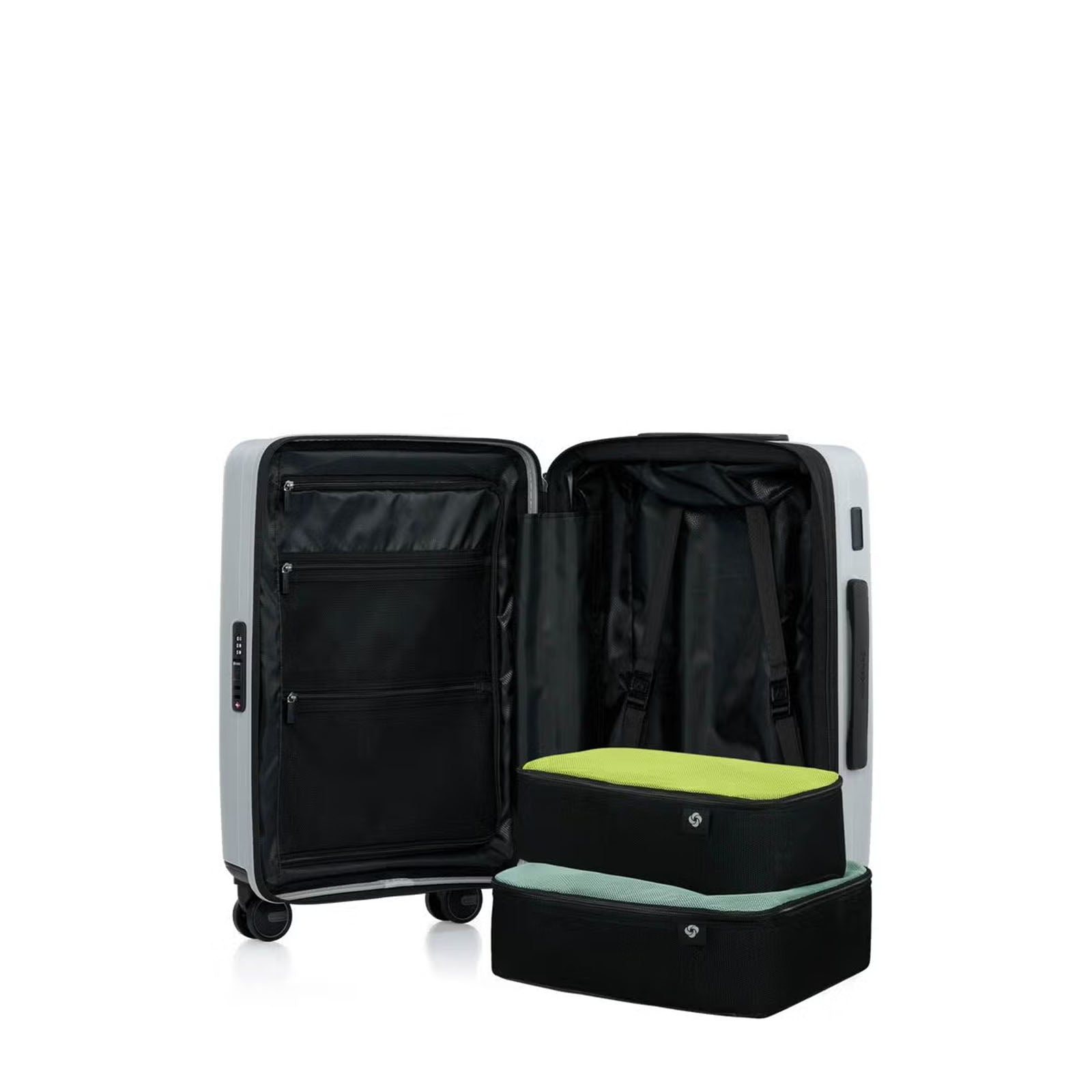 Samsonite Titanium colour open suitcase with two packing cubes inside on a white background