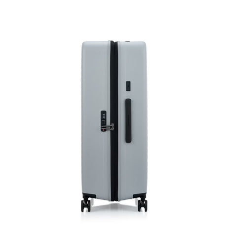 Samsonite Titanium colour suitcase with black accents on a white background