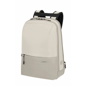 A light beige backpack with black mesh shoulder straps and black zipper pulls, shown from a three-quarter angle on a solid white background.