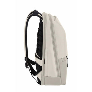 A light beige backpack shown from a side profile view, featuring black padded shoulder straps and a black side pocket, set against a plain white background.