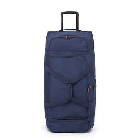A navy blue rolling duffel bag with an extended black telescoping handle, front zippered pocket, and straps, shown against a plain white background.