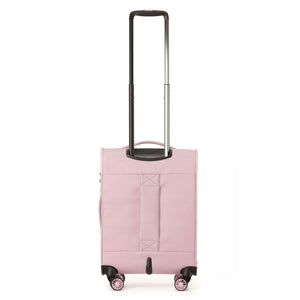 A light pink softside spinner suitcase with an extended telescoping handle, shown on a plain white background.