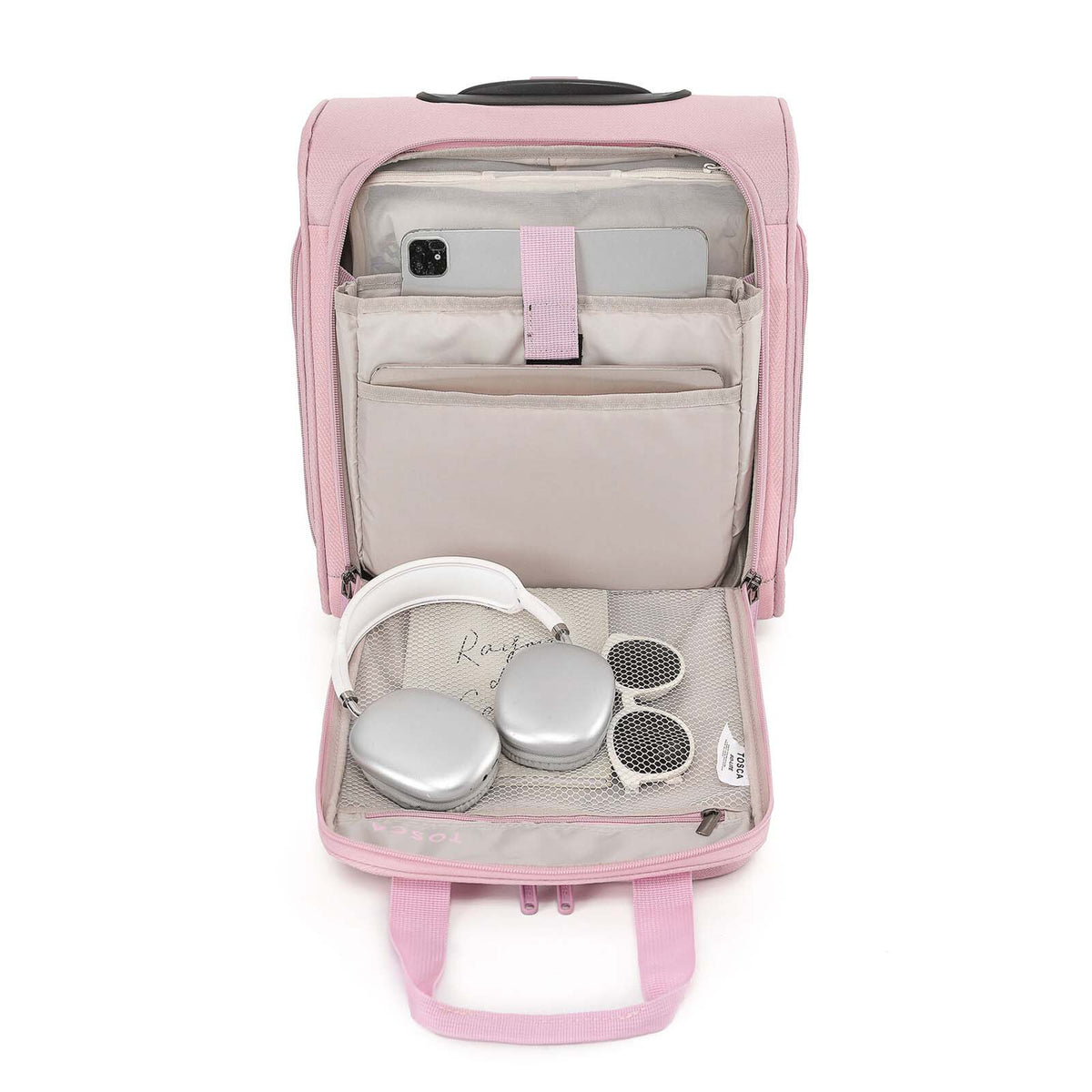 A pink rolling suitcase with an extended telescoping handle, shown on a plain white background. The suitcase features a top carry handle, a front zippered pocket, and spinner wheels.